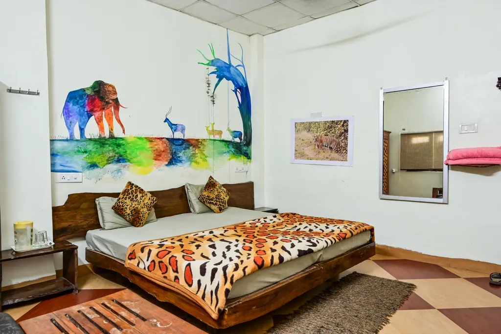 Cozy bedroom setup for wildlife travelers staying at hotels in Kanha