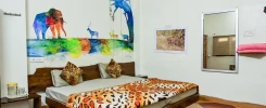 Cozy bedroom setup for wildlife travelers staying at hotels in Kanha